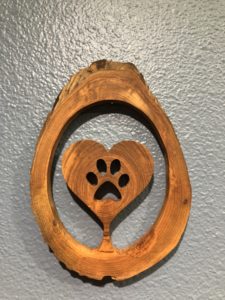 wooden wall decor with heart and paw print cut out